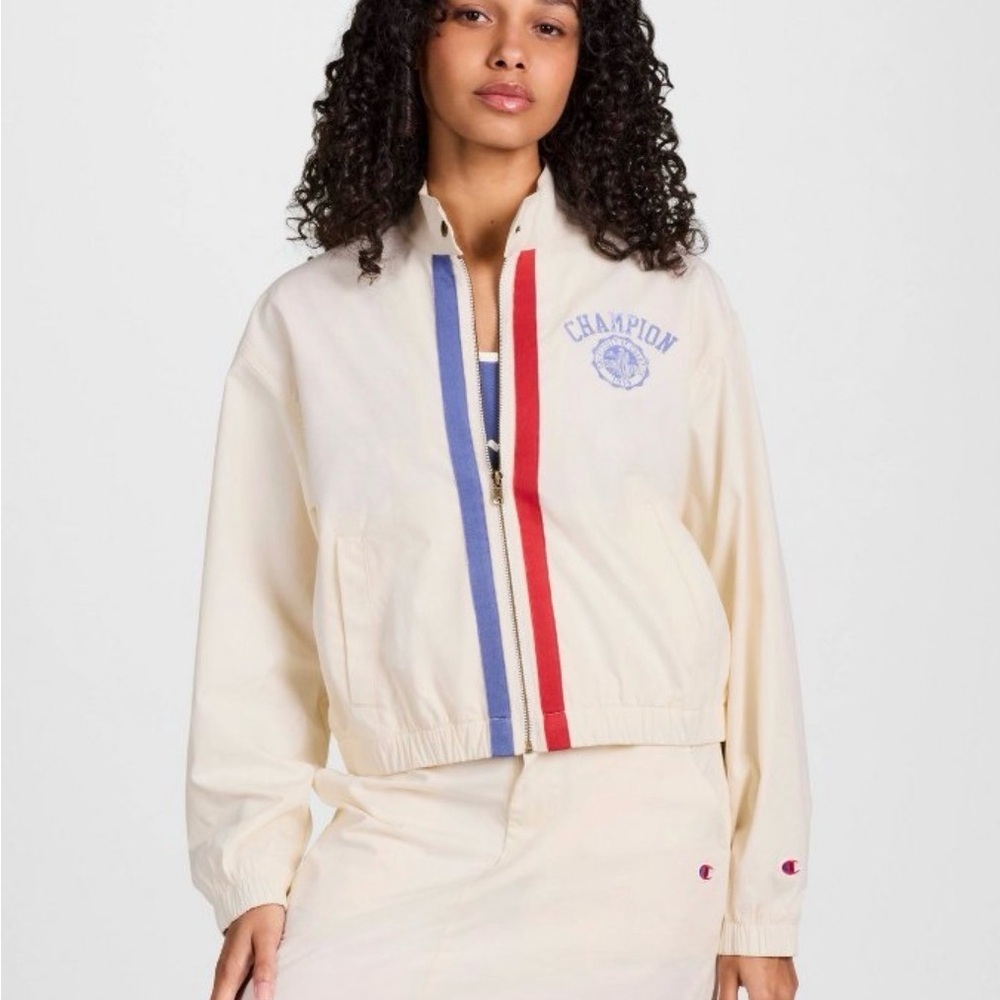 Champion Women's Varsity Jacket in Cream with Red and Blue Accents